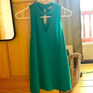 Naked Zebra halter blouse. Size medium. Color is a greenish turquoise.